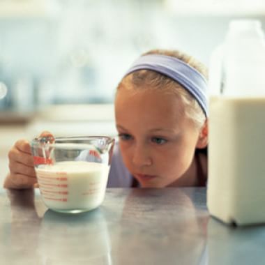 Measuring with children in the kitchen is a great way to naturally encourage math skills