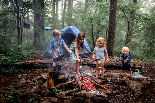 Kid's roasting marshmallows while camping is always a crowd pleaser 