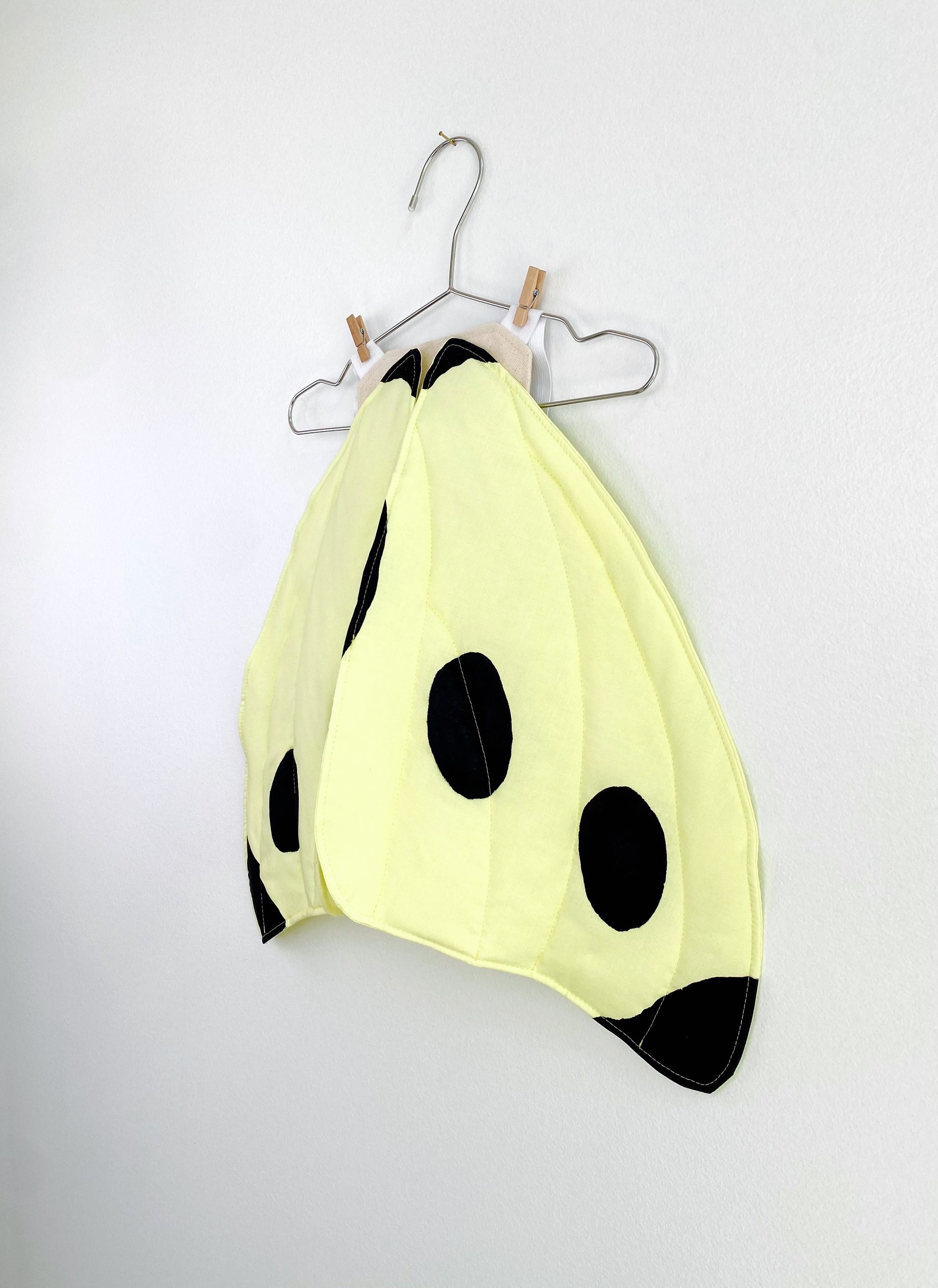 Black and yellow butterfly wings for a flying butterfly toy.