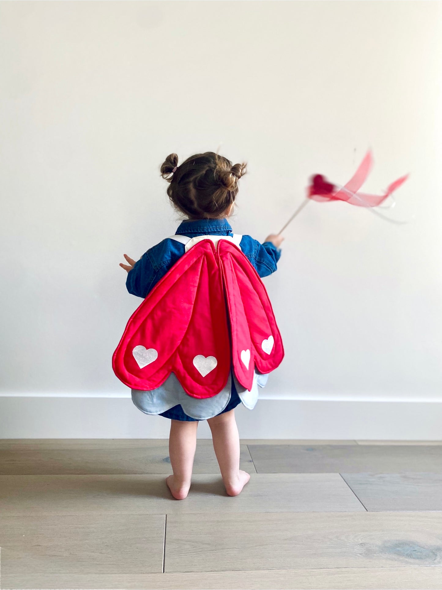 Valentines day outfit for girls wearing cupid wings.