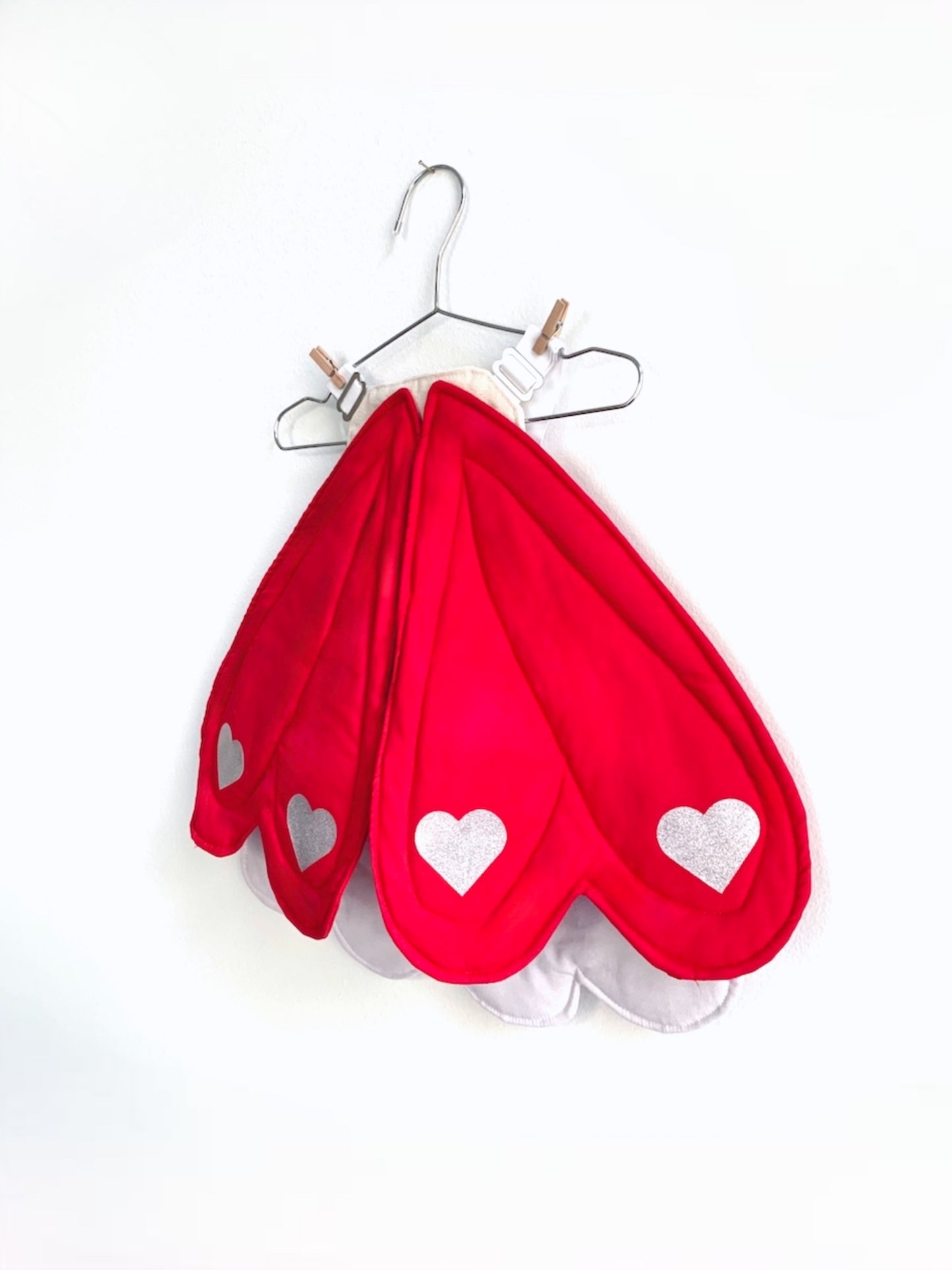 Valentine's day outfit wings with hearts for girls.