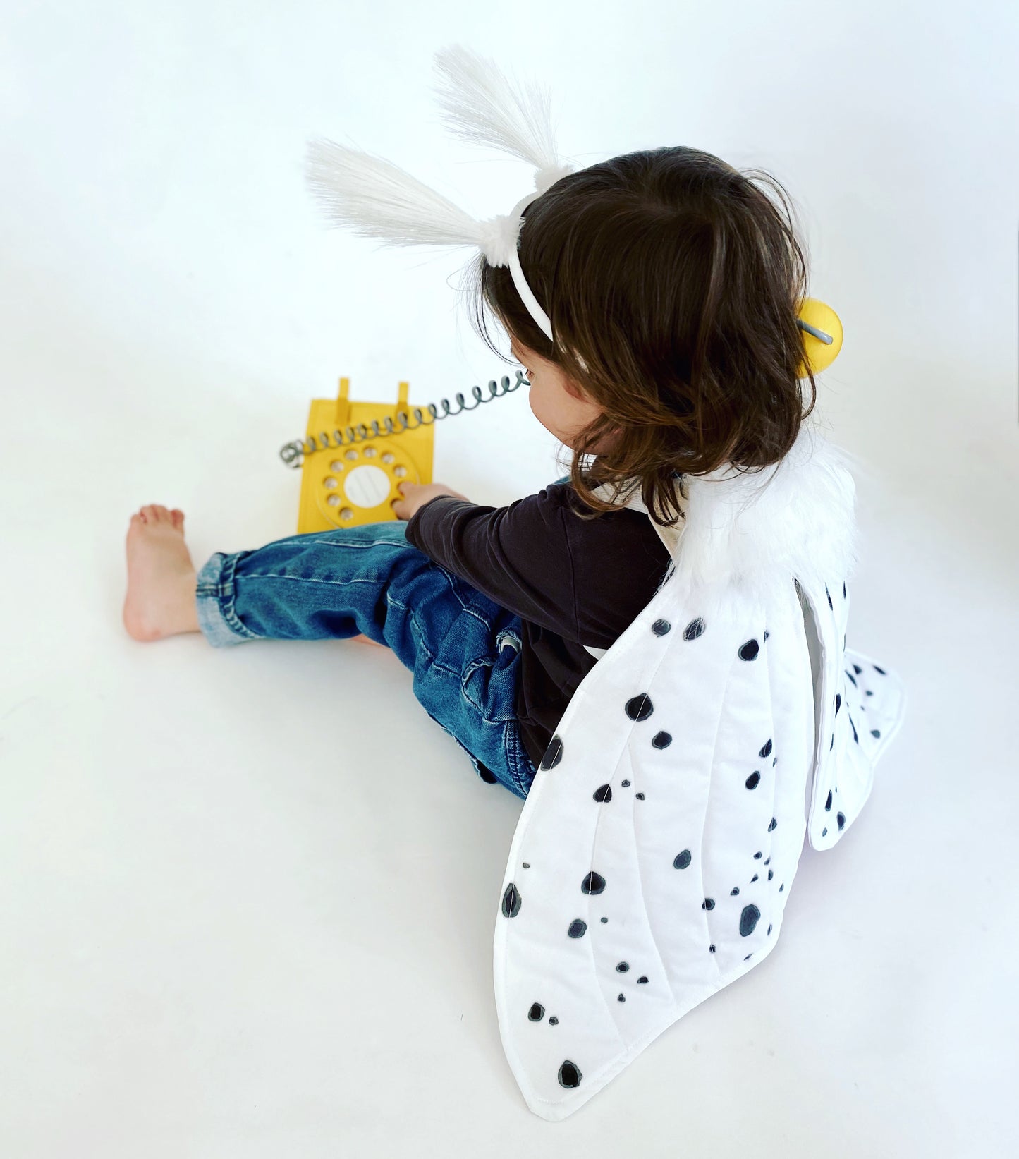 Furry white leopard moth pretend play with antennae headband.