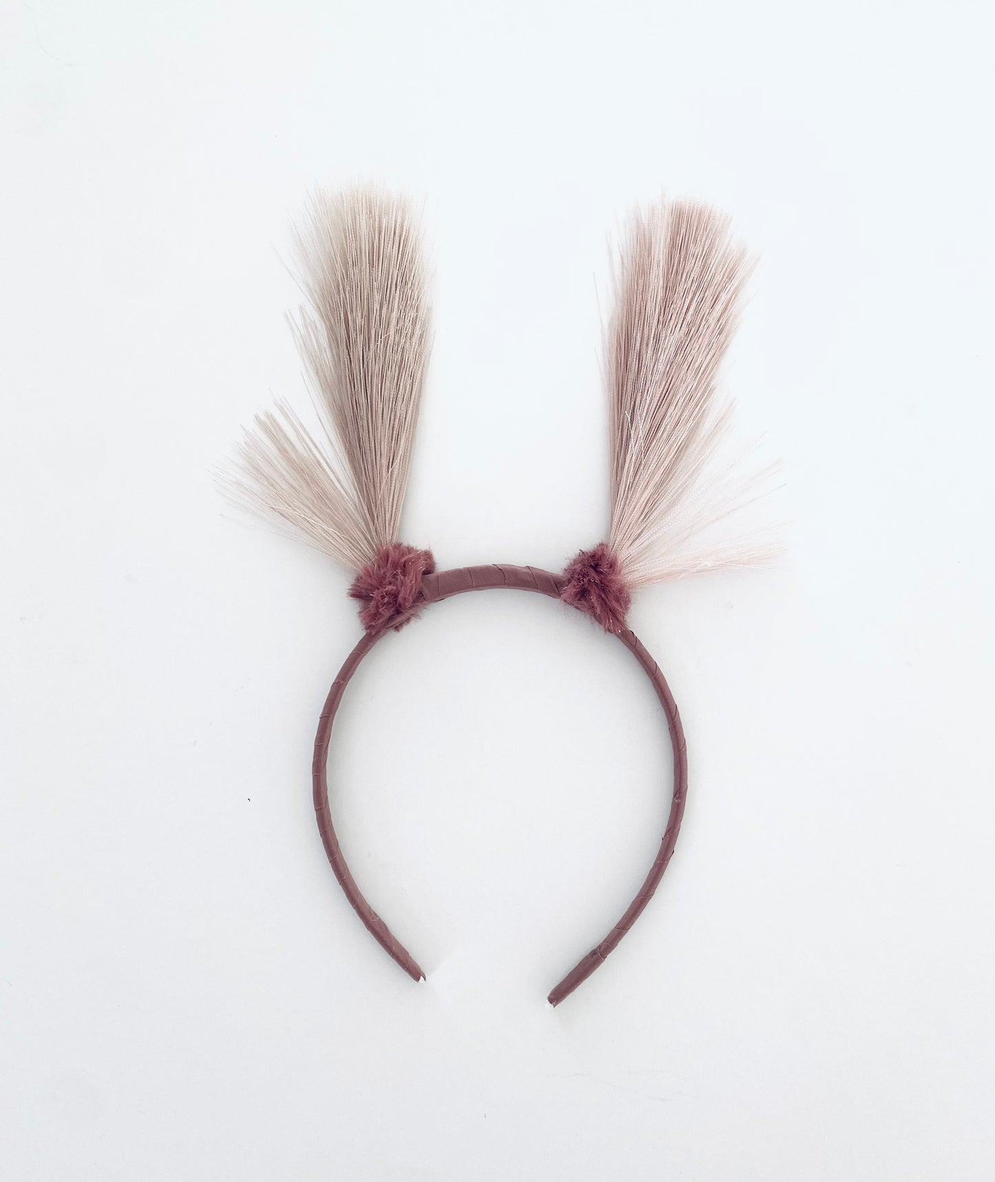 Pink moth antennae headband for kids and adults.
