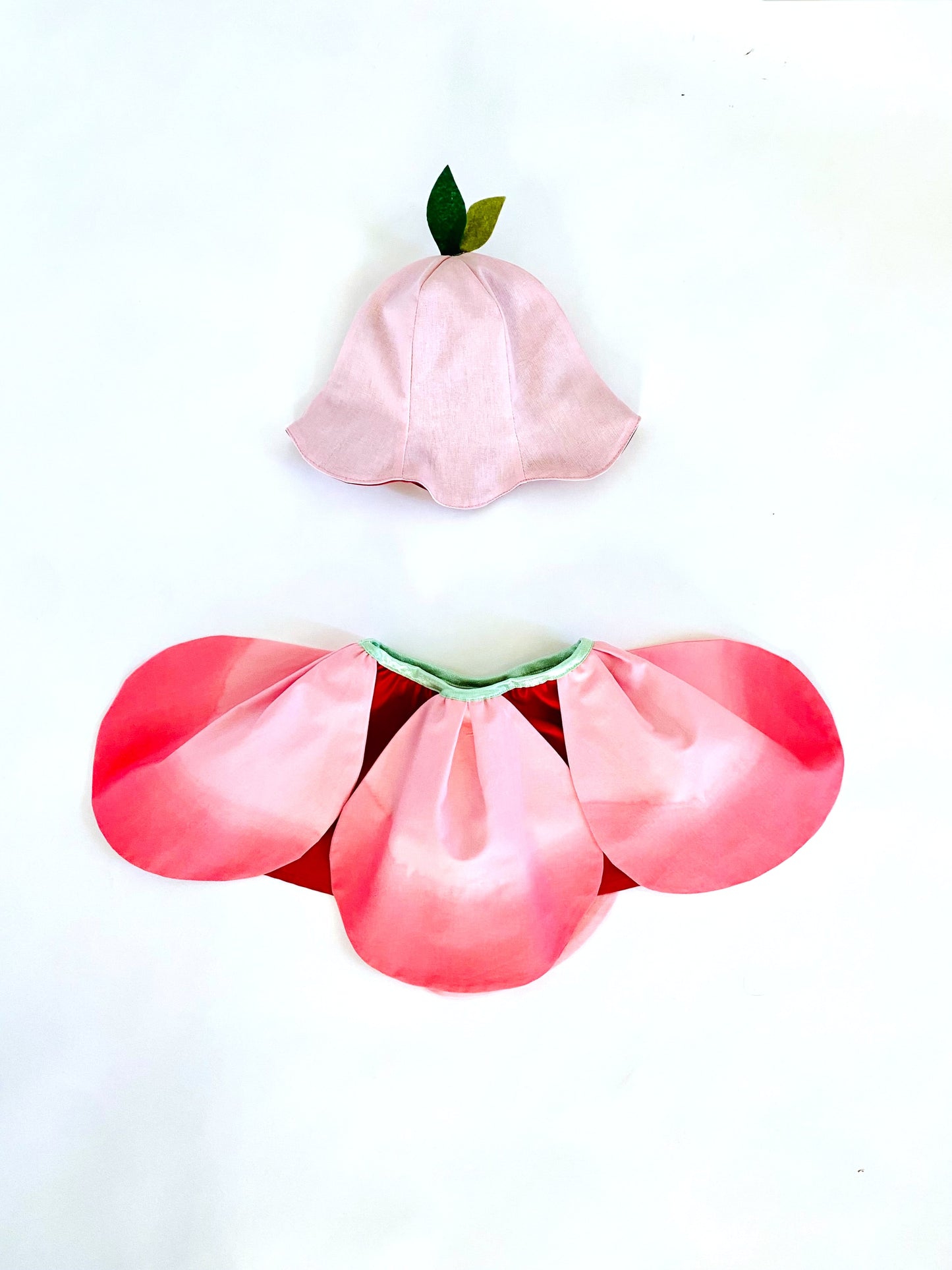 Flower petal skirt and hat costume.